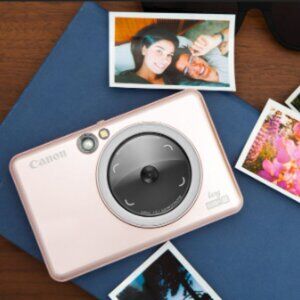 2-in-1 Cannon Ivy Digital and Polaroid Camera paired with 20 ct film photo